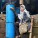 Dosen UMSU Rimbawati bersama tim merakit generator dari motor induksi bekas untuk pembangkit listrik tenaga mikrohidro di Dusun Bintang Asih.