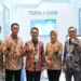 Direktur IT Digital Telkom Faizal Rochmad Djoemadi bersama jajaran TelkomGroup di booth Telkom Solution pada FEKDI x IFSE 2026 di JICC Jakarta
