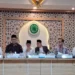 Asisten Deputi Kemenko PMK Asep Sunandar berbicara dalam acara Tukar Pikiran Wajib Halal Oktober 2026 di Aula Buya Hamka, Kantor MUI, Jakarta Pusat.