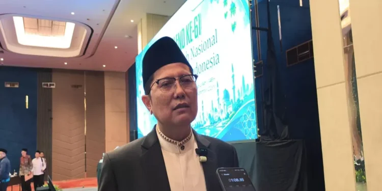 Ketua DSN MUI KH M Cholil Nafis saat memberikan tanggapan terkait kasus dugaan fraud PT Dana Syariah Indonesia di Rapat Pleno DSN MUI Ke-61 Tahun 2026.
